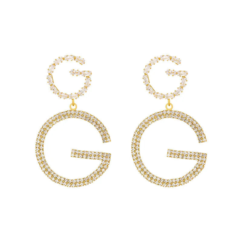 gucci golden earrings letter G